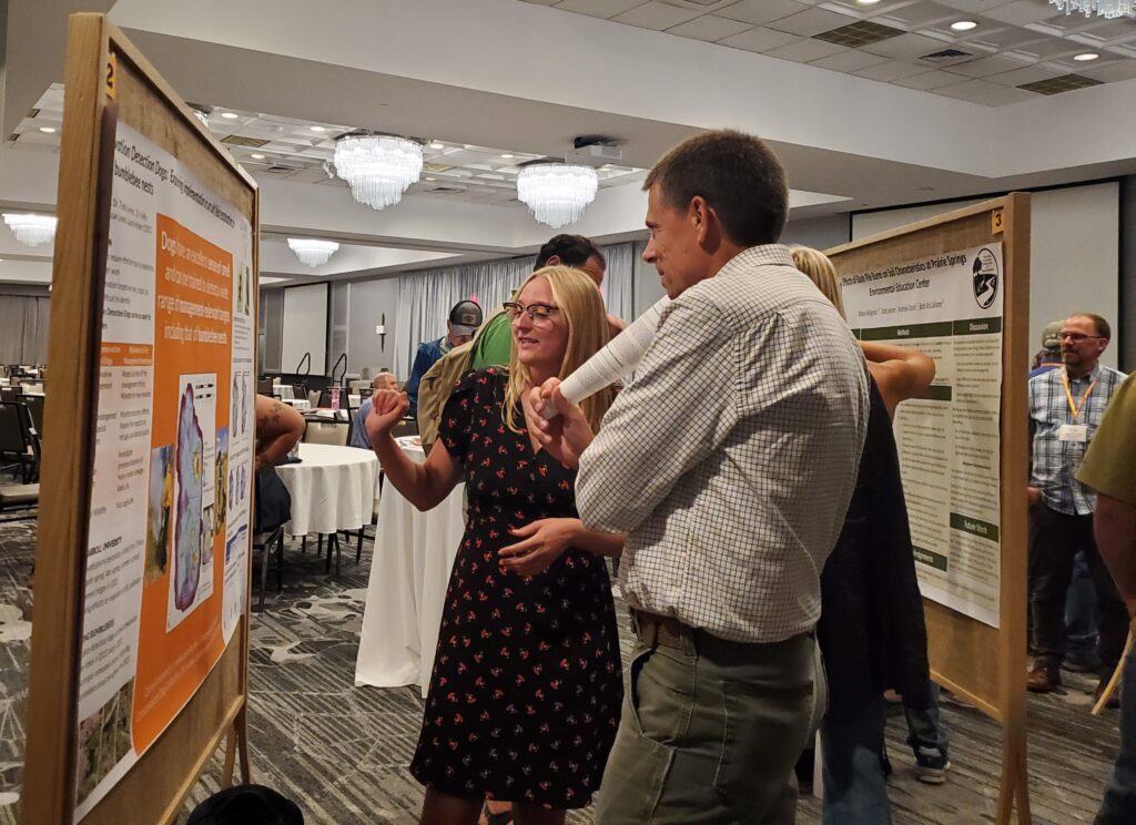 Two people talking at a Poster Session - Rx Fire Workshop Madison